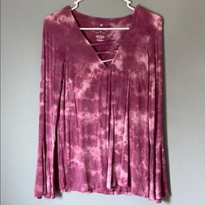 Blush/distressed long sleeve flared top